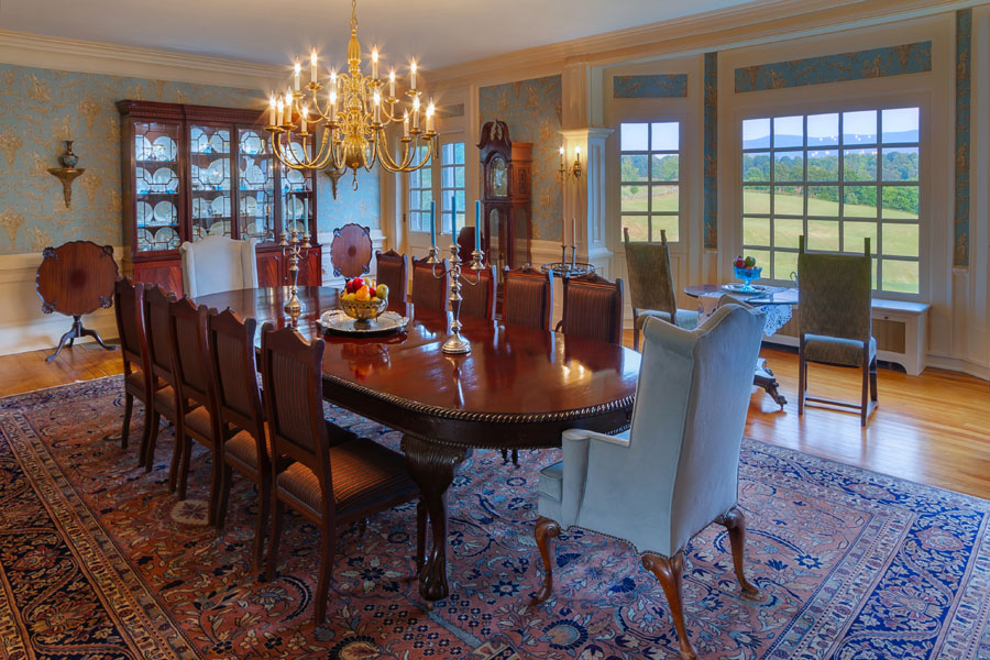 formal dining room with table for 12 people at the inn at forest oaks, natural bridge, virginia