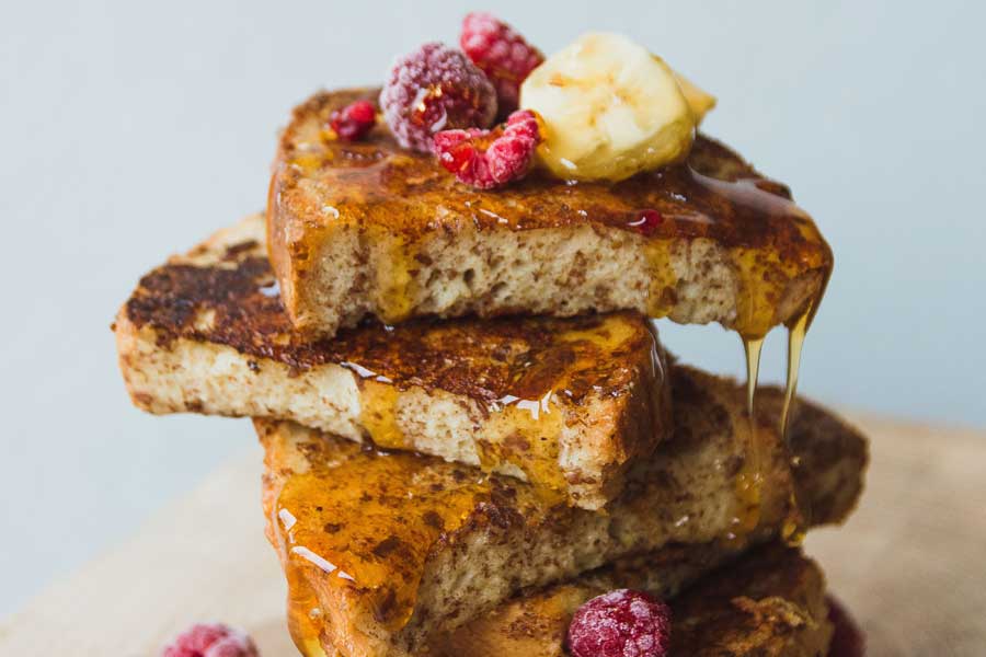 french toast with raspberries butter and syrup