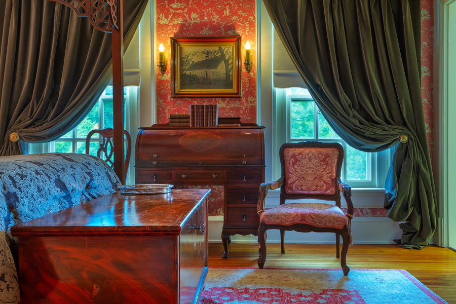 long branch guestroom with antique furniture at the inn at forest oaks in natural bridge virginia