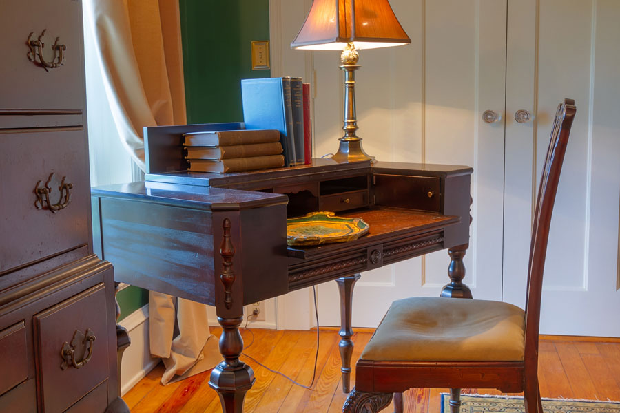 milburn room antique writing desk and chair at the inn at forest oaks in natural bridge virginia