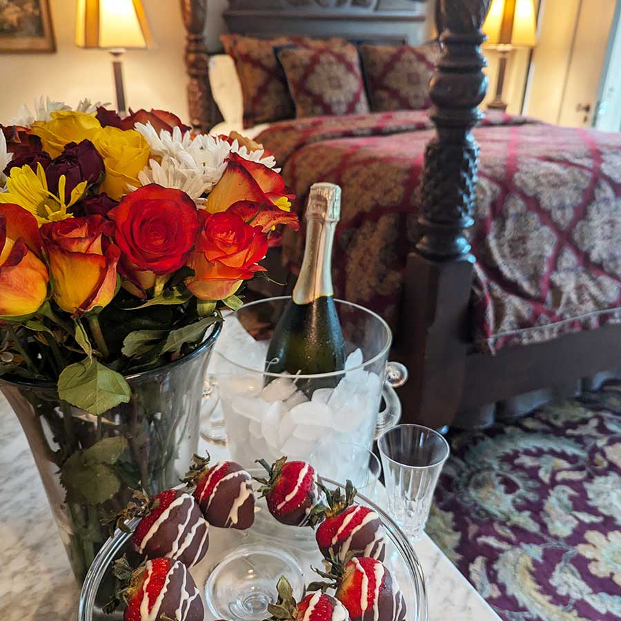 romantic escape package including strawberries, champagne, and flowers for two