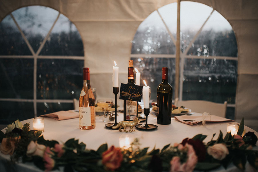 wine and candles at a wedding at the inn at forest oaks